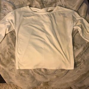 Oversized white long sleeve with cross cross back